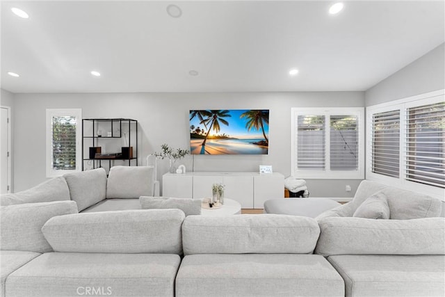 living room featuring recessed lighting