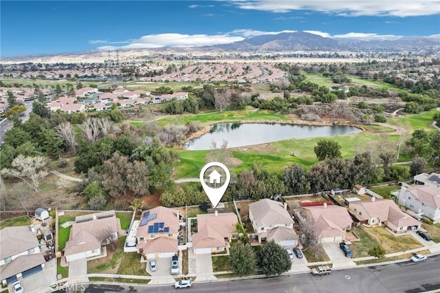 aerial view featuring a residential view and a water and mountain view