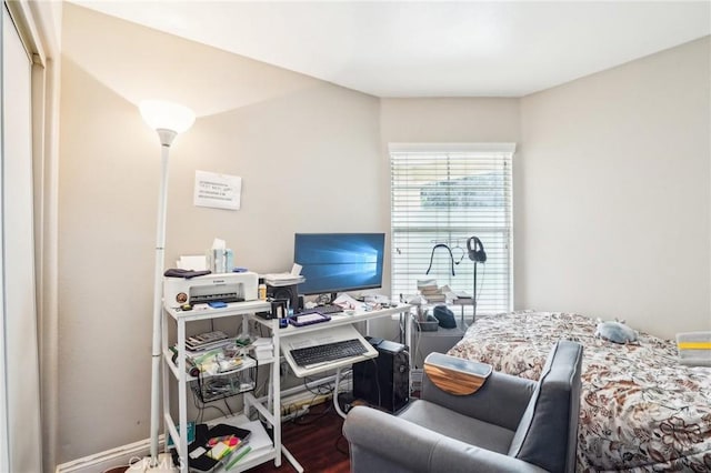 bedroom featuring wood finished floors