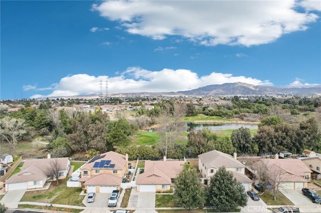 aerial view with a residential view and a water and mountain view