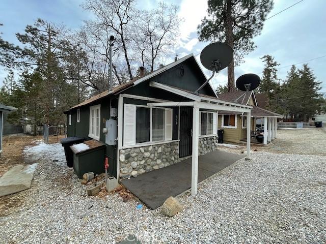 view of front of property featuring stone siding