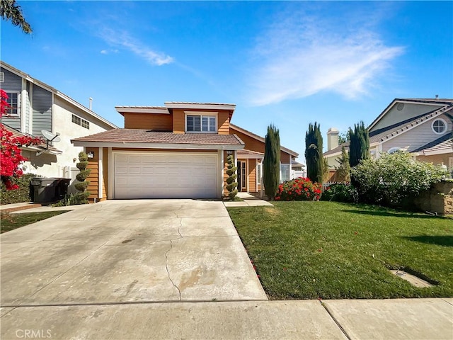 view of front facade with a garage, driveway, a front lawn, and a tile roof