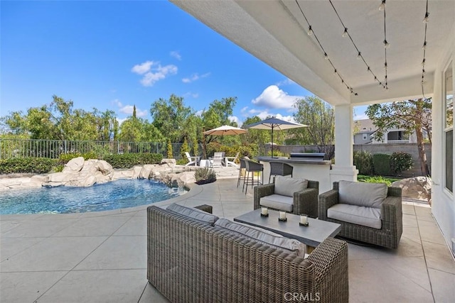 view of swimming pool featuring area for grilling, a patio, a fenced backyard, a fenced in pool, and an outdoor hangout area