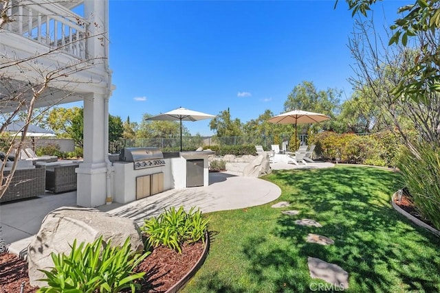 view of yard with an outdoor living space, a patio, area for grilling, and fence