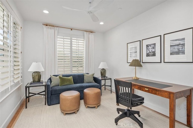 office with recessed lighting and baseboards