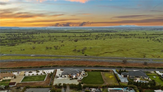 aerial view at dusk with a rural view