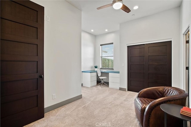 carpeted office with recessed lighting, built in study area, ceiling fan, and baseboards