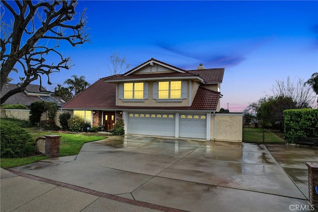 6153 Peridot Ave, Alta Loma, CA 91701 - traditional-style home featuring a tile roof, a chimney, stucco siding, and a garage