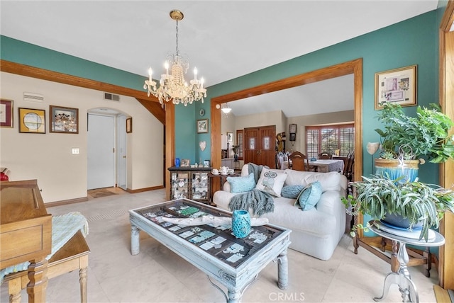 6153 Peridot Ave, Alta Loma, CA 91701 - living room with a chandelier and arched walkways