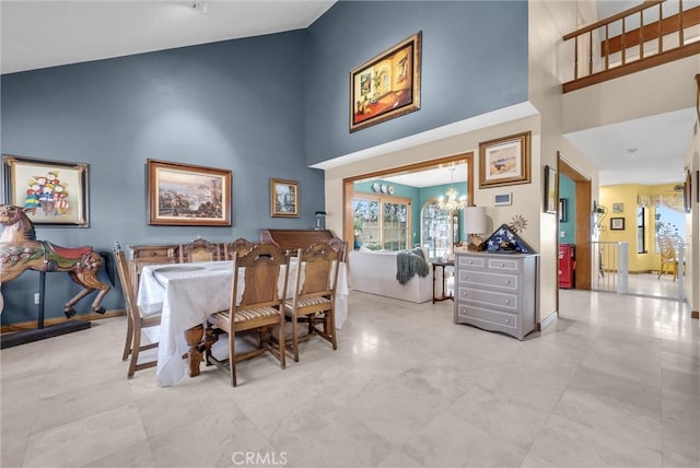 6153 Peridot Ave, Alta Loma, CA 91701 - dining space featuring a high ceiling and a chandelier