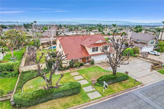 6153 Peridot Ave, Alta Loma, CA 91701 - aerial perspective of suburban area with a mountainous background