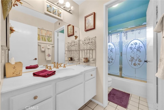 6153 Peridot Ave, Alta Loma, CA 91701 - bathroom featuring toilet, vanity, tile patterned floors, and enclosed tub / shower combo
