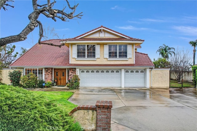 6153 Peridot Ave, Alta Loma, CA 91701 - traditional home with a tiled roof, concrete driveway, fence, an attached garage, and stucco siding