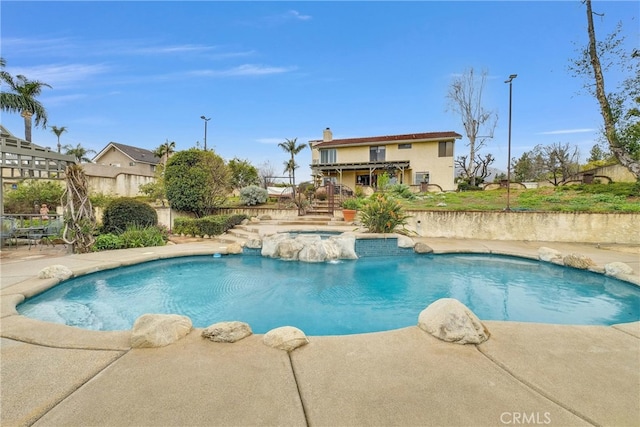 6153 Peridot Ave, Alta Loma, CA 91701 - view of pool featuring stairs, fence, a patio area, and a pool with connected hot tub