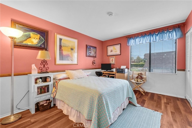 6153 Peridot Ave, Alta Loma, CA 91701 - bedroom with wood finished floors, baseboards, and an office area