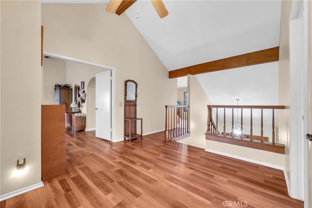 6153 Peridot Ave, Alta Loma, CA 91701 - additional living space with a ceiling fan, beamed ceiling, high vaulted ceiling, arched walkways, and wood finished floors