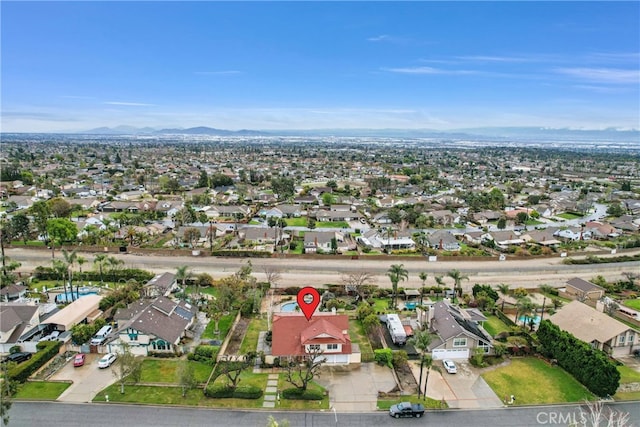 6153 Peridot Ave, Alta Loma, CA 91701 - aerial view of property and surrounding area with nearby suburban area and mountains