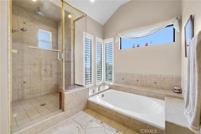 6153 Peridot Ave, Alta Loma, CA 91701 - bathroom featuring plenty of natural light, a stall shower, a garden tub, tile patterned floors, and lofted ceiling