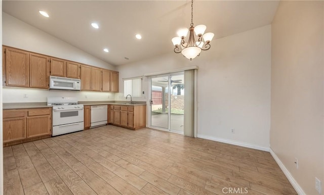 kitchen featuring recessed lighting, white appliances, baseboards, light countertops, and light wood finished floors