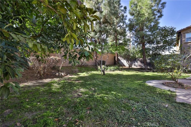 view of yard with fence