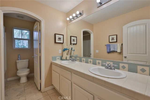 1230 Cantania Dr, Redlands, CA 92374 - bathroom featuring double vanity, tile patterned floors, and a shower
