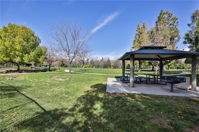 surrounding community featuring a lawn and a gazebo