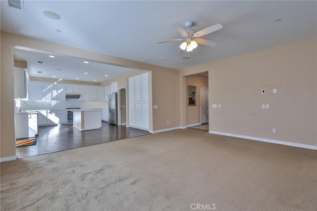 1230 Cantania Dr, Redlands, CA 92374 - unfurnished living room featuring carpet floors, a ceiling fan, baseboards, and recessed lighting