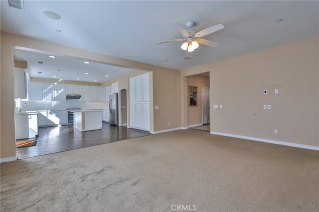 1230 Cantania Dr, Redlands, CA 92374 - unfurnished living room featuring carpet flooring, ceiling fan, and recessed lighting