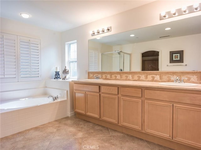 1230 Cantania Dr, Redlands, CA 92374 - full bathroom with double vanity, a bath, a shower stall, tile patterned flooring, and recessed lighting