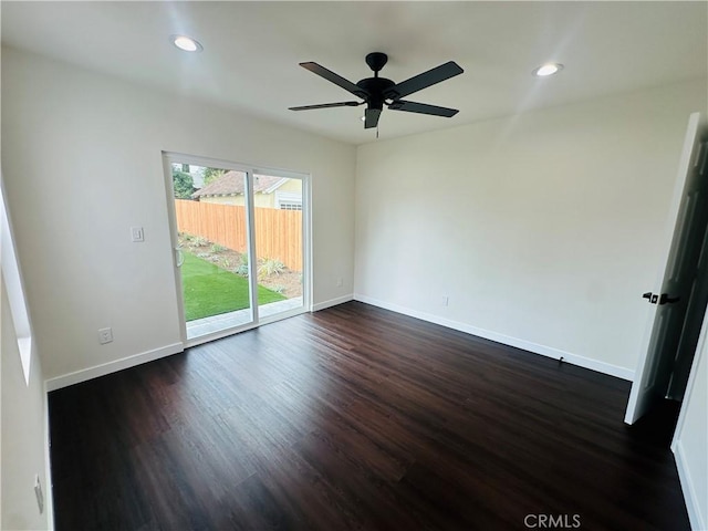 spare room featuring recessed lighting, dark wood-style floors, baseboards, and ceiling fan