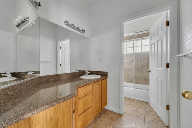 bathroom featuring bathing tub / shower combination, vanity, and tile patterned floors