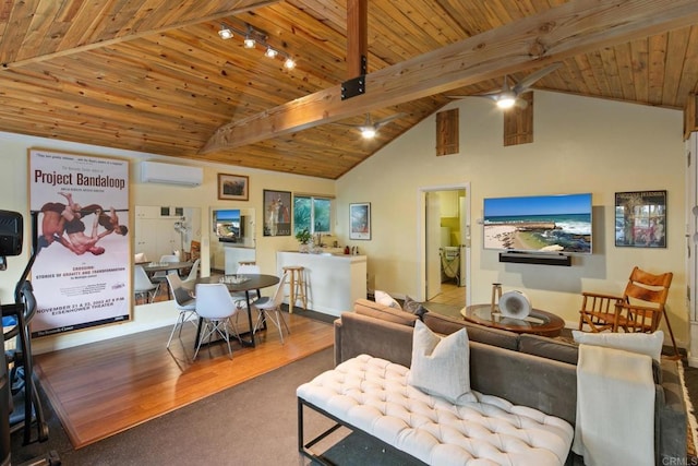 living room with an AC wall unit, beamed ceiling, high vaulted ceiling, and wood ceiling