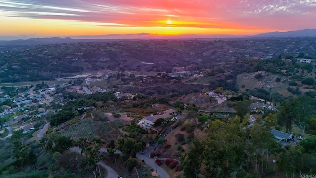 aerial view at dusk with a mountain view