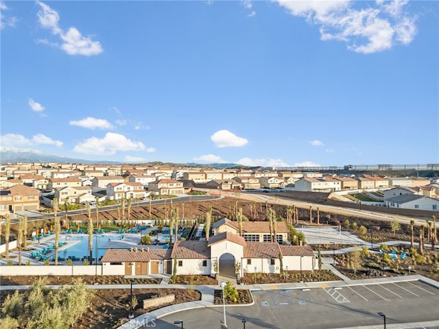 birds eye view of property with a residential view