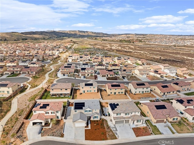 aerial view featuring a mountain view and a residential view