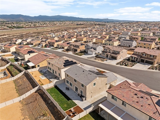 drone / aerial view with a residential view and a mountain view