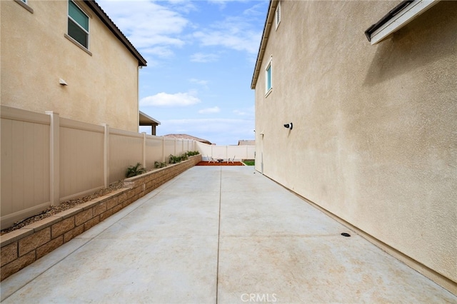 view of patio featuring a fenced backyard