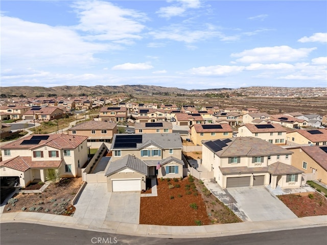 birds eye view of property with a residential view