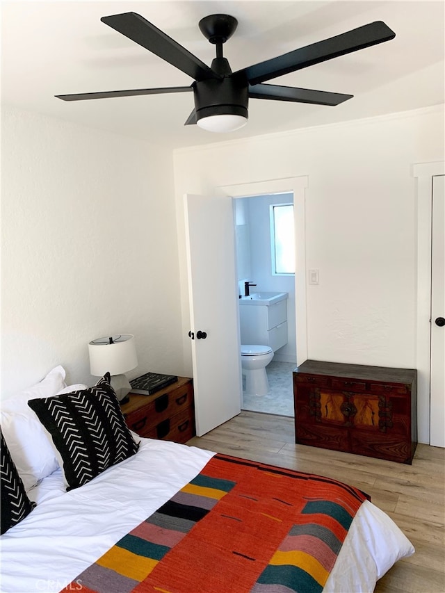 3443 W Blvd, Los Angeles, CA 90016 - bedroom with wood finished floors, ensuite bathroom, and a ceiling fan