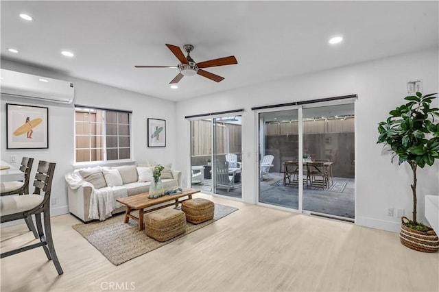 309 W Avenida Palizada, San Clemente, CA 92672 - living area featuring recessed lighting, ceiling fan, wood finished floors, a wall mounted air conditioner, and baseboards