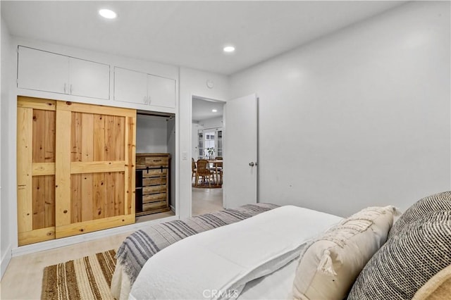 309 W Avenida Palizada, San Clemente, CA 92672 - bedroom with light wood-style floors and recessed lighting