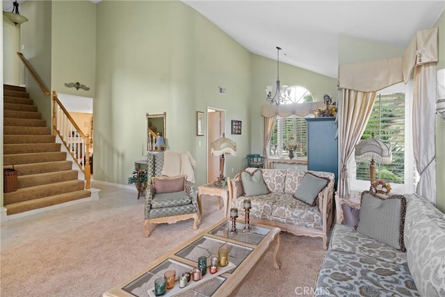 carpeted living area with high vaulted ceiling, stairway, and a notable chandelier