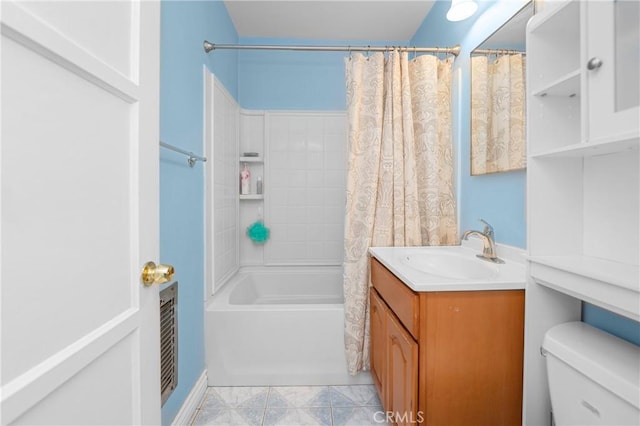 full bathroom with shower / bath combo, vanity, and toilet