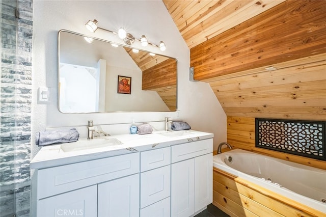 bathroom with double vanity, wood ceiling, vaulted ceiling, a sink, and a bath