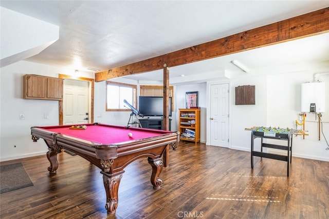 recreation room featuring baseboards, tankless water heater, beamed ceiling, and wood finished floors