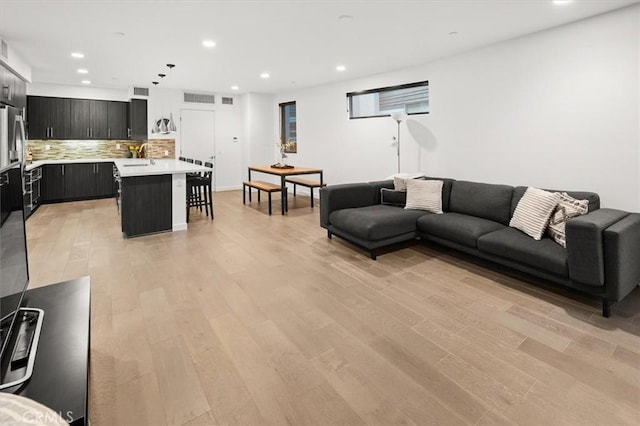 1923 N Gower St, Los Angeles, CA 90068 - living room with recessed lighting and light wood-style flooring