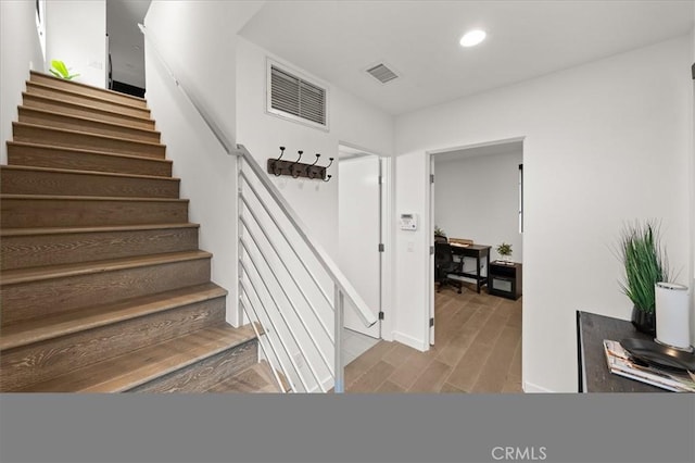1923 N Gower St, Los Angeles, CA 90068 - stairs with wood finished floors, recessed lighting, and baseboards