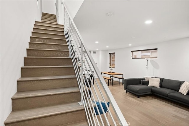 1923 N Gower St, Los Angeles, CA 90068 - stairs featuring wood finished floors and recessed lighting