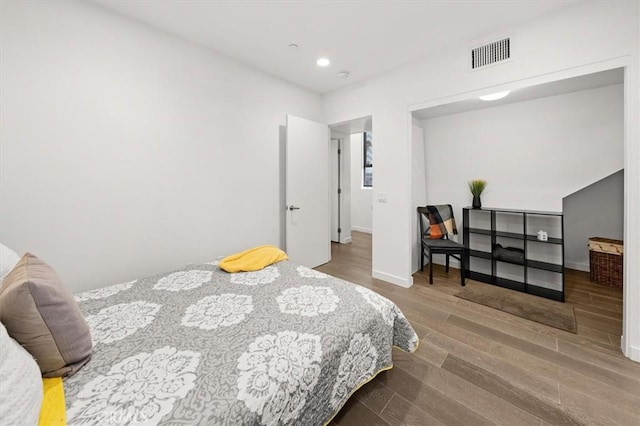 1923 N Gower St, Los Angeles, CA 90068 - bedroom featuring wood finished floors, recessed lighting, and baseboards