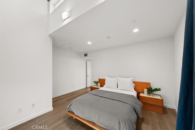 1923 N Gower St, Los Angeles, CA 90068 - bedroom featuring baseboards, wood finished floors, and recessed lighting
